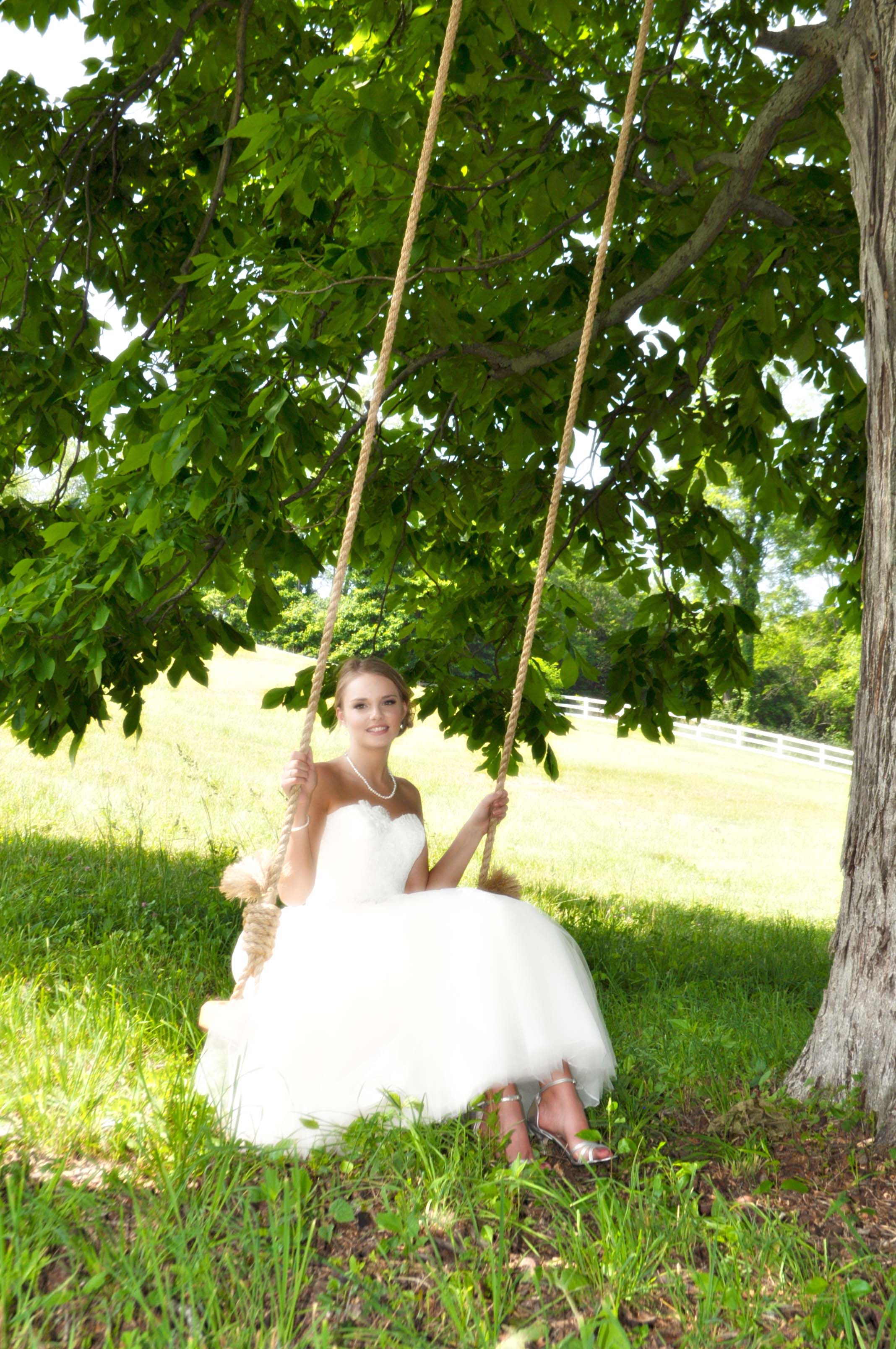 Bride on tree swing